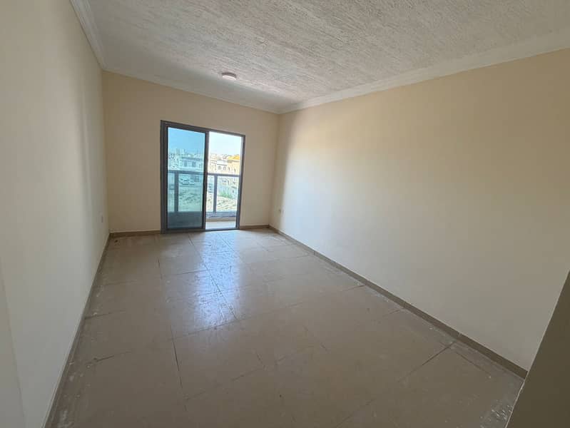 On Sheikh Ammar Road! 2BR Apartment with Balcony in Al Mowaihat 2 – AED 32,000
