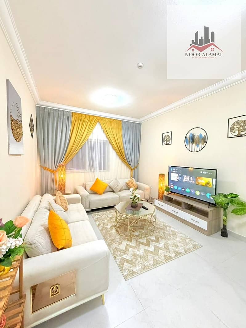 Sharjah - Al Taawun - Super Deluxe 2-bedroom apartment with a spacious living room, fully equipped kitchen, and 2 bathrooms