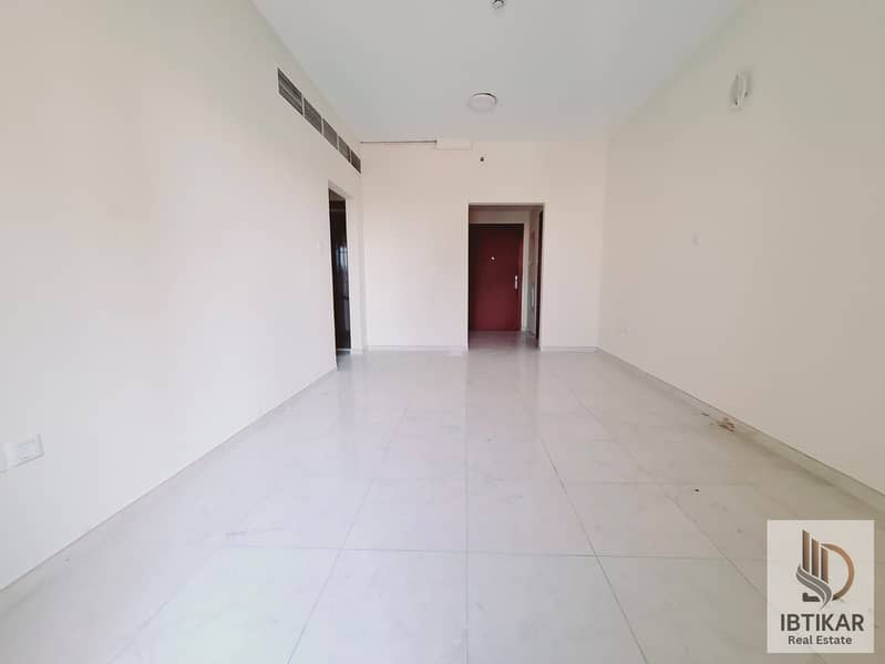 VERY HUGE 1BHK WITH 2WASHROOMS +BALCONY CLOSE TO MEGA MALL SHARJAH