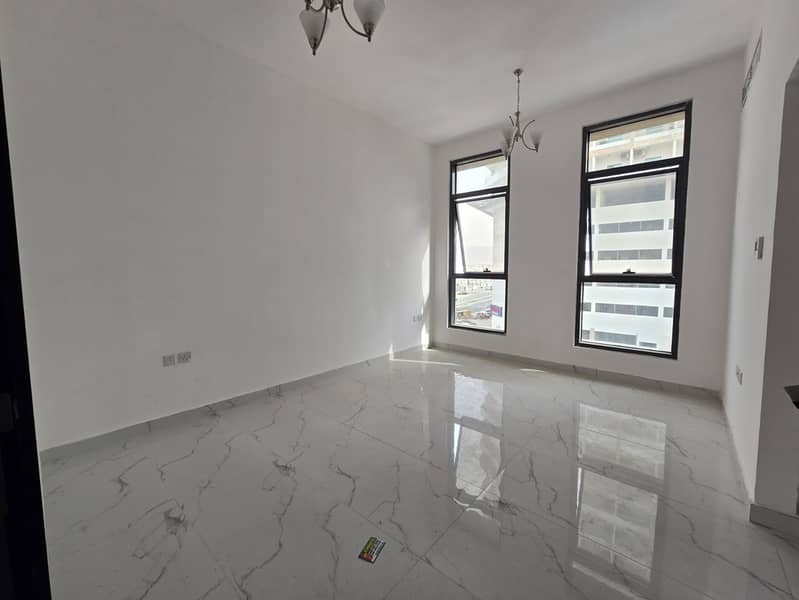 Nice apartment in Al Alia with a quiet location near Emirates City. Includes 1 bedroom, hall, central AC, and free maintenance.