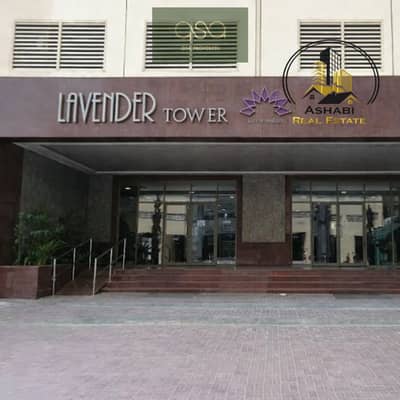 شقة 2 غرفة نوم للايجار في مدينة الإمارات، عجمان - Lavender Tower entrance on a sunny day. png شقة 2 غرفة نوم للايجار في مدينة الإمارات، عجمان - Lavender Tower entrance on a sunny day. png