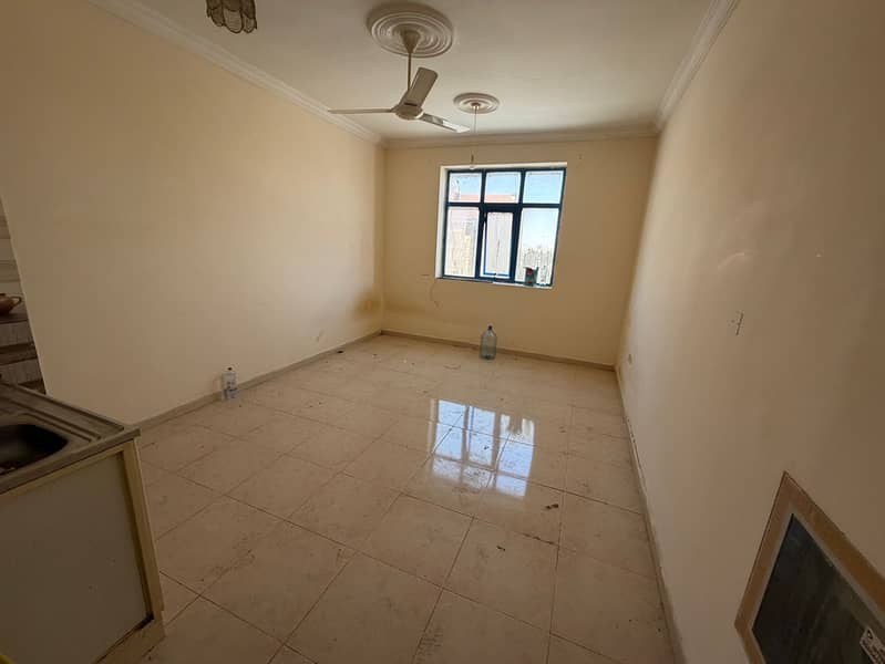 Studio apartment in Al Muwaihat, near the Saudi German Hospital. Central air conditioning. Maintenance is the owner's responsibility. Suitable for fam