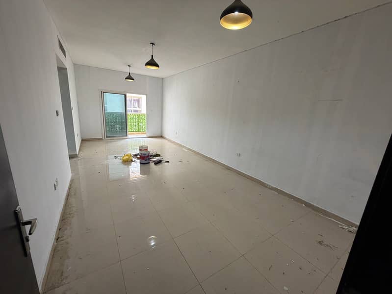 One-bedroom apartment for annual rent in Al Muwaihat 3, Ajman. Spacious, large balcony, excellent layout, new building, central air conditioning,