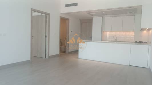 فلیٹ 1 غرفة نوم للايجار في قرية جميرا الدائرية، دبي - kitchen livingroom (5). jpg