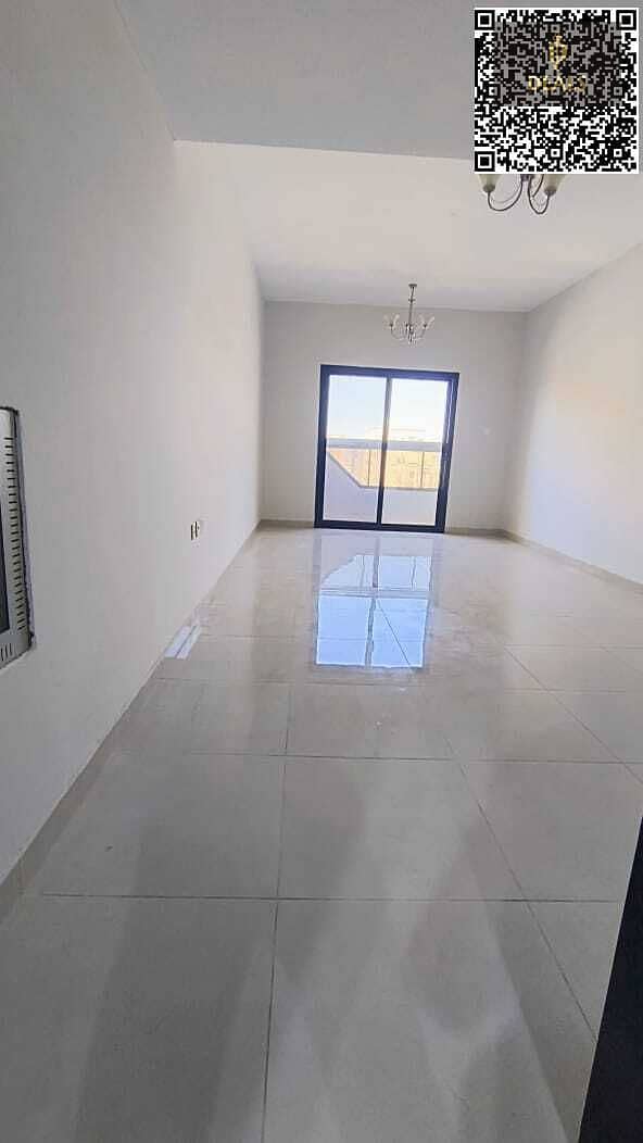 Luxury 2-Bedroom Apartment for Rent in Al Jurf 3 with 2 Bathrooms, Balcony, Central AC, Separate Living Area & Parking – Spacious Layout Near Services