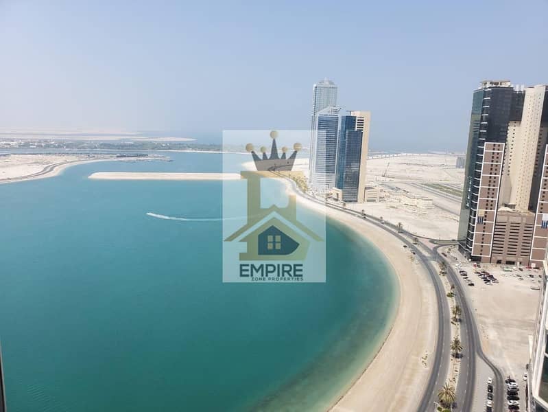 Spacious apartment with full sea view, parking free, full pandemic window, gym, swimming pool, free maintenance, free kids player free very easy. Exit to Dubai Al Mamzar, Sharjah.