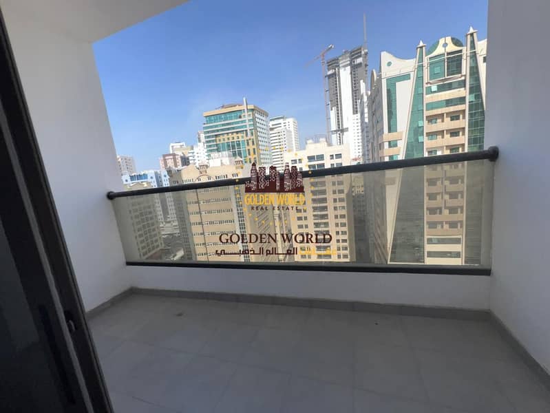 2-bedroom apartment with a living room in Al Khan, featuring a balcony with an open street view, two master bedrooms, 3 bathrooms, a storage room, pri