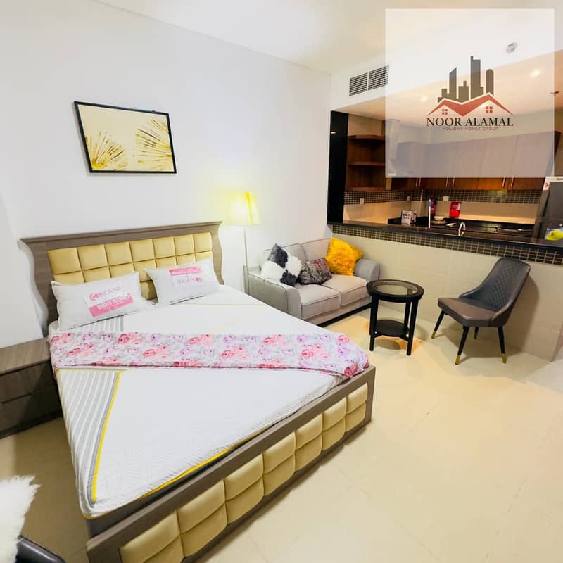 Dubai, Al Furjan, furnished studio apartment with hotel-style furnishings, second occupancy. Large room, American-style kitchen, and bathroom. Price:
