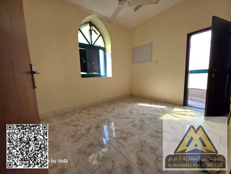 A spacious one-bedroom apartment in a prime location in Al Rashidiya, opposite the fish market on Al Mina Street. The unit is on the second floor (no