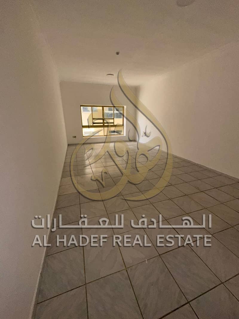For annual rent in Sharjah: a two-bedroom apartment with a living room, excellent size, and a balcony. Family building - free maintenance.