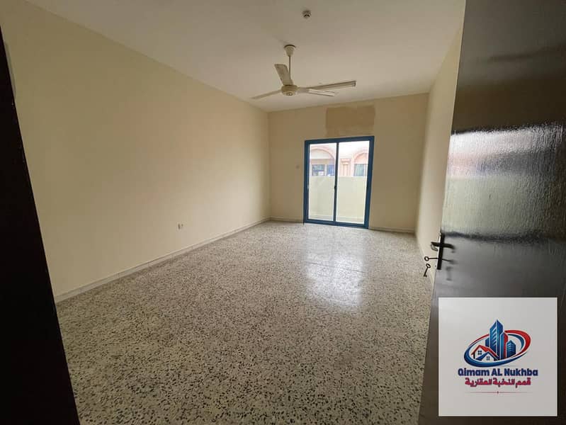 For annual rent in Al Shuwaiheen area: Two-bedroom apartment with a living room and 2 balconies for only 31,000 AED per year.