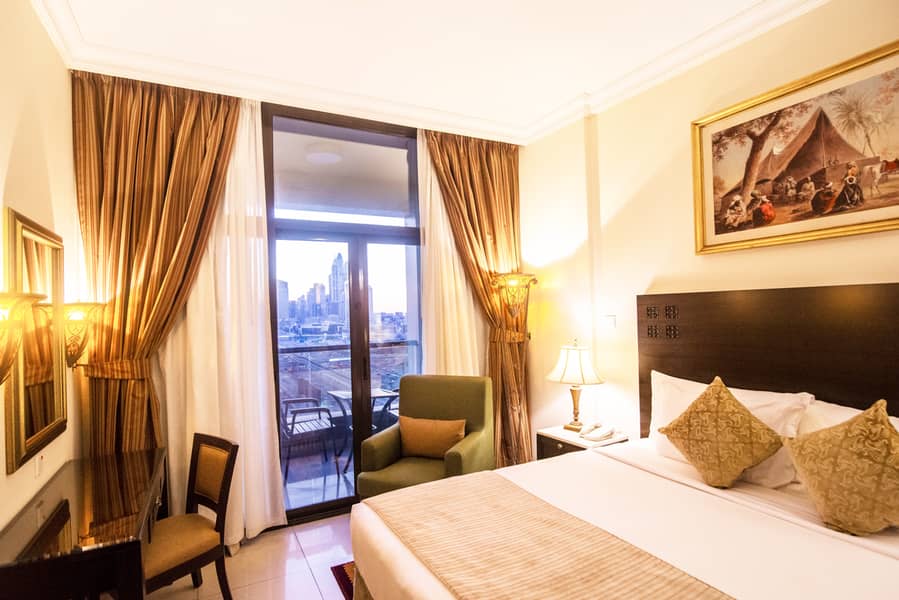 2 MERCURE DUBAI Bedroom 009 with view. . jpg