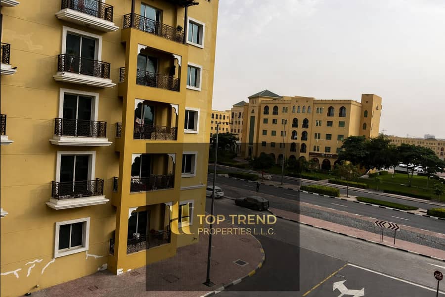 6 Balcony view over Mediterranean street. png