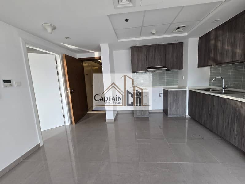 Hot Offer | Modern 1BHK | L-Shape Kitchen | Open View | Pool, Gym & Parking | AED 53K