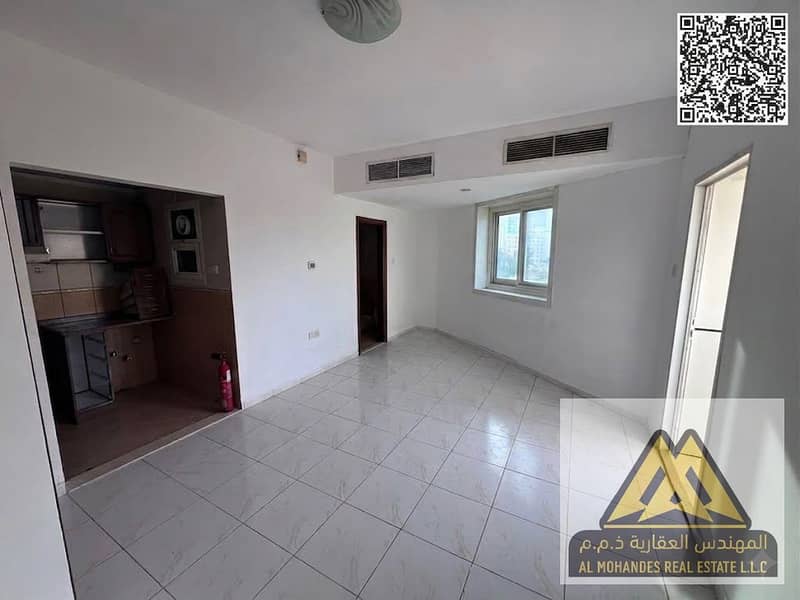 Spacious Studio Apartment | Balcony | Built-in Wardrobes | Prime Location Close to All Amenities | Easy Access to Sharjah and Dubai