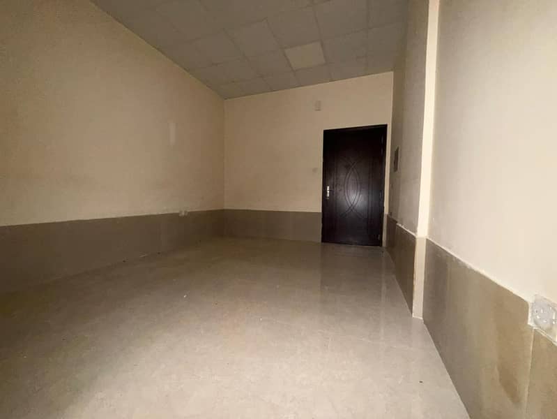 A spacious studio for annual rent in Jarf 2, Ajman, in a very special location near the court and Ajman University