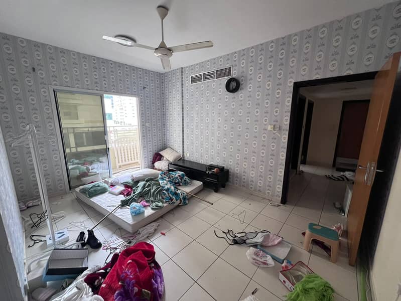 A one-bedroom apartment with a living room is available for annual rent in Al Nuaimiya, Ajman. Located in a prime location on Khalifa Street, next to