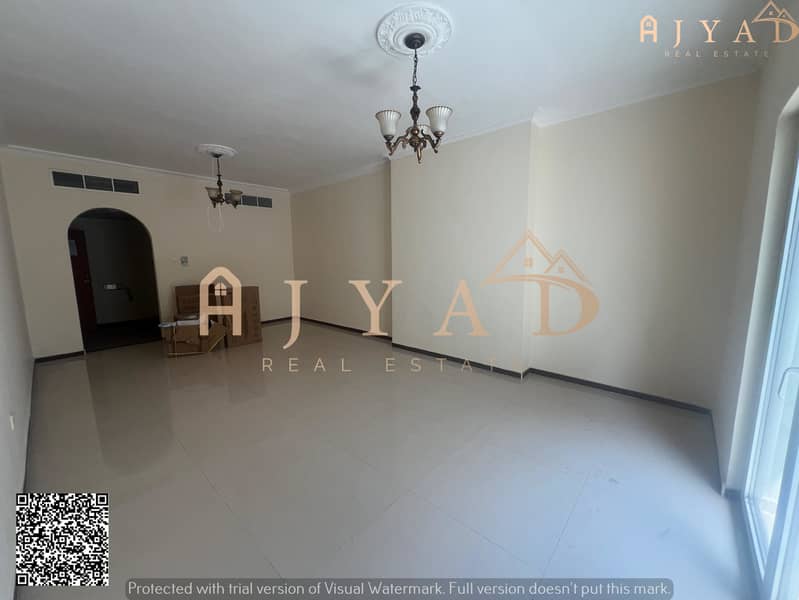 For rent: 2 bedrooms hall in Al Nuaimiya 3 Ajman, near Mashreq Bank, 2 bathrooms, balcony, central AC, AED 38,000
