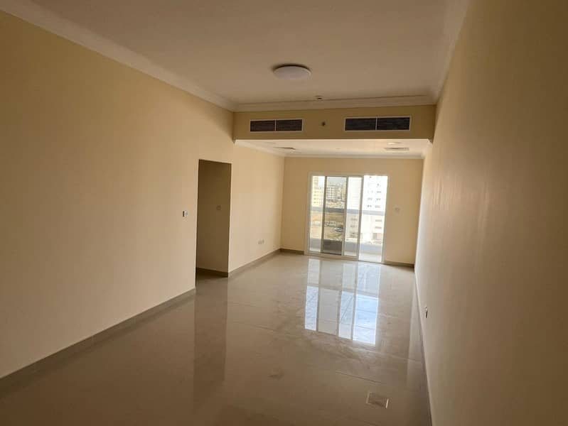 Two-bedroom apartment with a living room - Al Jurf 3, Ajman - near the Chinese market - central air conditioning - family accommodation