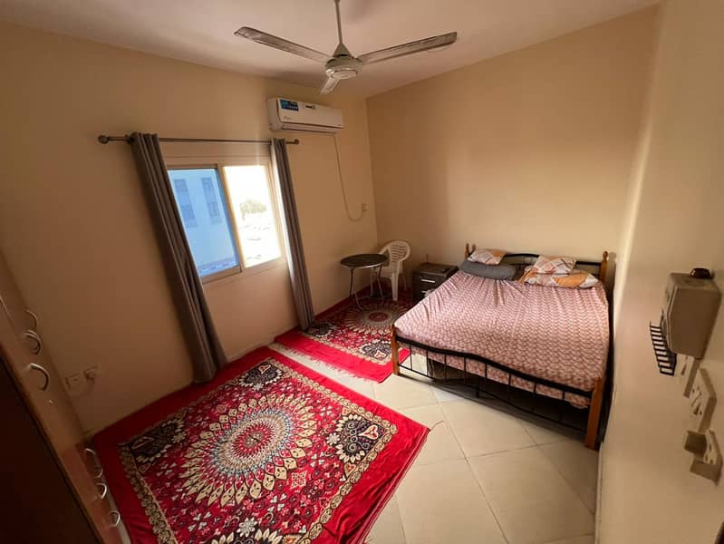 For annual rent in Al Rawda 1 Ajman, a one bedroom apartment with living room located near Kenz Mall and close to Sheikh Mohammed Bin Zayed Road in a