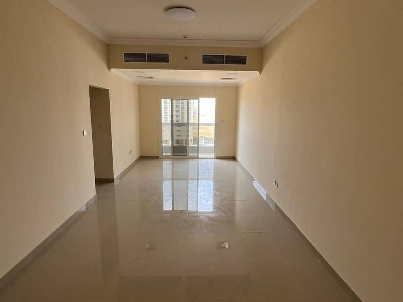 Two bedrooms and a living room in Al Jurf 3, next to the Chinese market. Excellent location, close to all services. Annual rent.