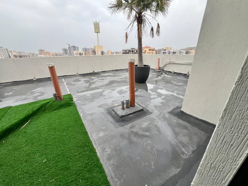 Two-bedroom apartment with a living room in Al Jurf 3 | Master bedroom + 2 bathrooms - direct view