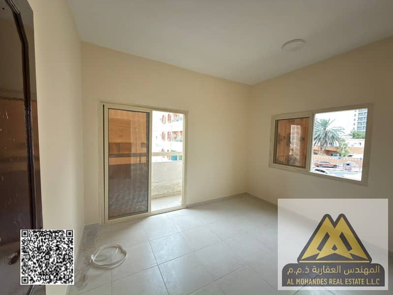 Two-bedroom apartment for annual rent in Al Nuaimiya 2, Ajman – Lowest prices and prime location