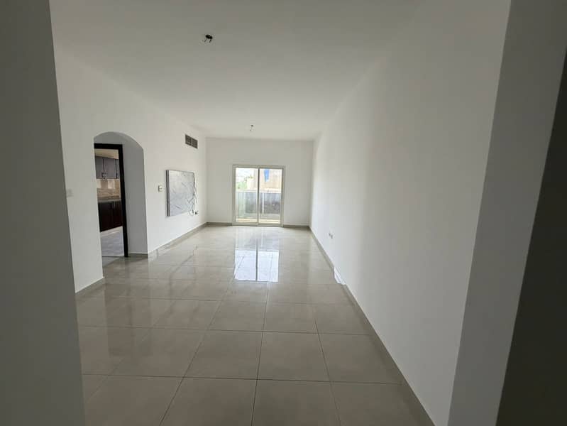 Two-bedroom apartment with a living room, separate kitchen, balcony with an open view,three master bathrooms,and central air conditioning in Al Rawda2