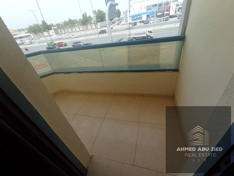 Luxury 4-bedroom apartment in Al Rawda 2, Ajman, opposite Al Kenz Mall. Features 9 bathrooms, 2 living rooms, 6 balconies, and a maid's room. Rent is