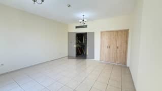 Unfurnished Studio | Balcony | Community & Road View | EMR-06 International City