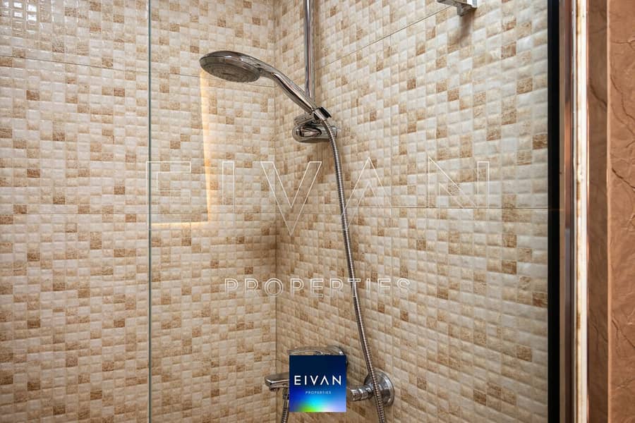 7 Modern shower with chrome fixtures. png