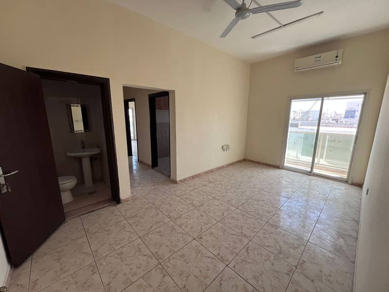For employees - Two rooms and a living room - Balcony - Excellent space - Reasonable price - Prime location in Al Rawda