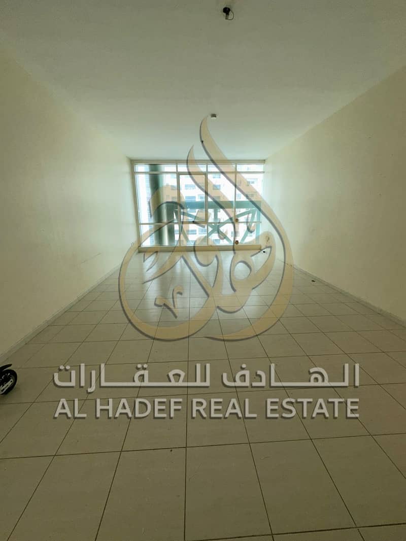 Family-friendly opportunity on Al Taawun Main Street: 3 bedrooms, living room, and maid's room, opposite Oriana Hotel, with free air conditioning.