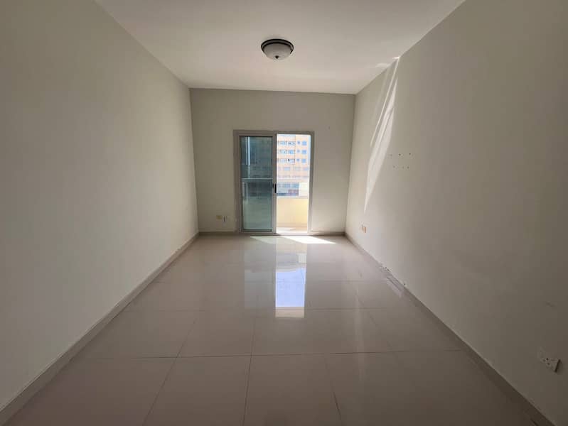 Studio apartment with a balcony, spacious, prime location, flexible payment options, close to all amenities, easy access to Dubai and Sharjah.