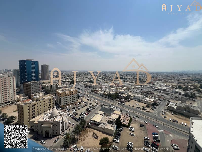 For rent: 2 bedrooms hall apartment in Al Nuaimiya 3 Ajman, first occupancy, near Dubai Islamic Bank, 2 bathrooms, central AC, free parking