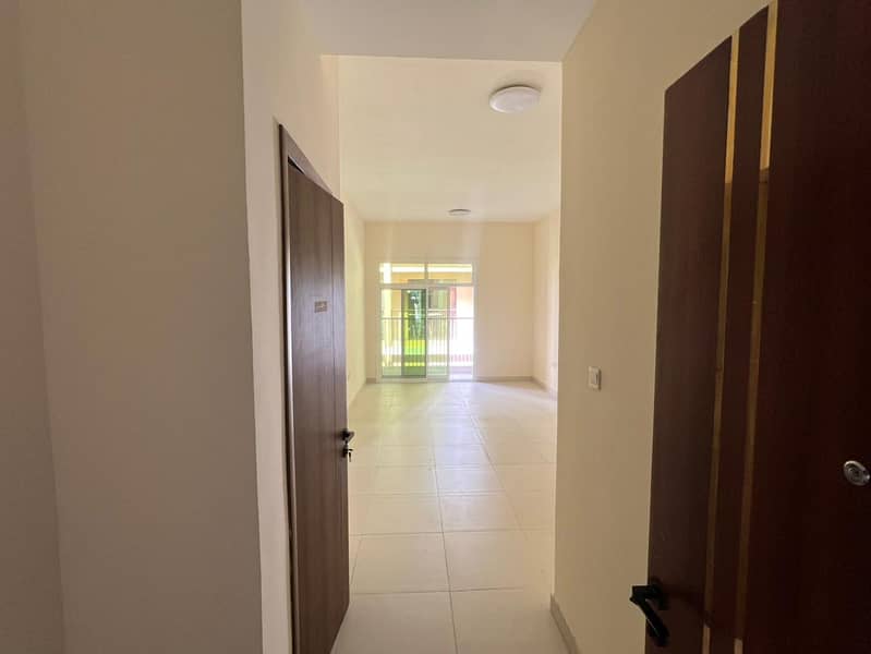 Al Muwaihat 3, near the academy, one-bedroom apartment for annual rent. First occupancy. Two bathrooms. Central air conditioning. Free maintenance