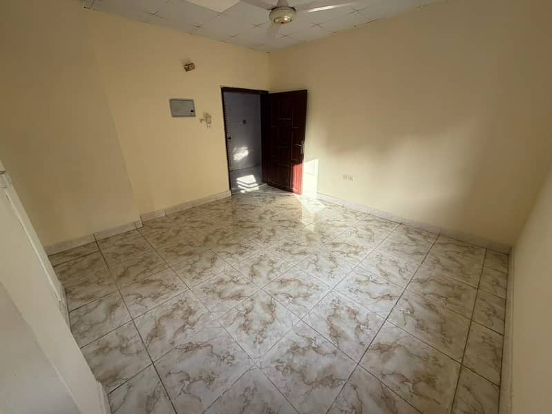 Al Rashidiya, next to Nesto Market, near Al Mina Street, one-bedroom apartment for annual rent, no air conditioning, no elevator. Clean apartment