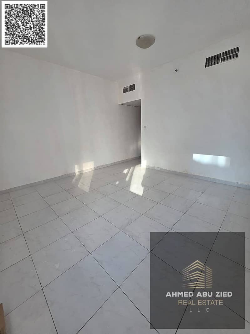 Luxurious and stylish one-bedroom apartment in Falcon, 1100 sq ft, with a balcony, 31,000 AED, central air conditioning, open view balcony, prime and