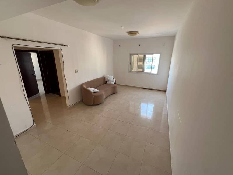 Al Jurf 2, behind Delta Center, near the court and Ajman University, Sheikh Ammar Street. Two-bedroom apartment with a living room for annual rent. Tw