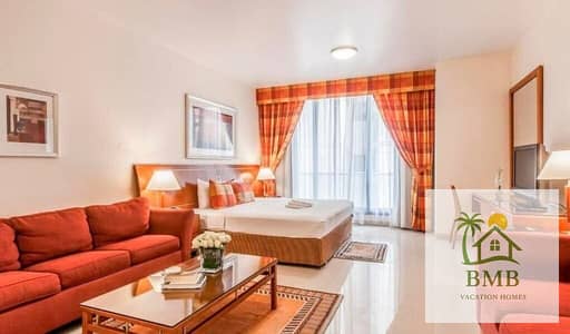 3 Bedroom Hotel Apartment for Rent in Bur Dubai, Dubai - gs living room. jpg