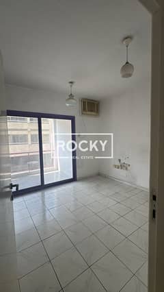 Semi Furnished 1br with Window A/ C Provided near Sheikh Hamdan Colony, Karama