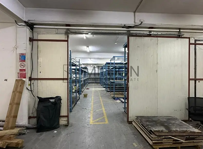 High-Clearance Warehouse with Loading Bay - More