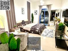 استوديو مميز للبيع في برج النعيمية C - مفروش بالكامل | طابق مرتفع | إطلالة على فندق رامادا