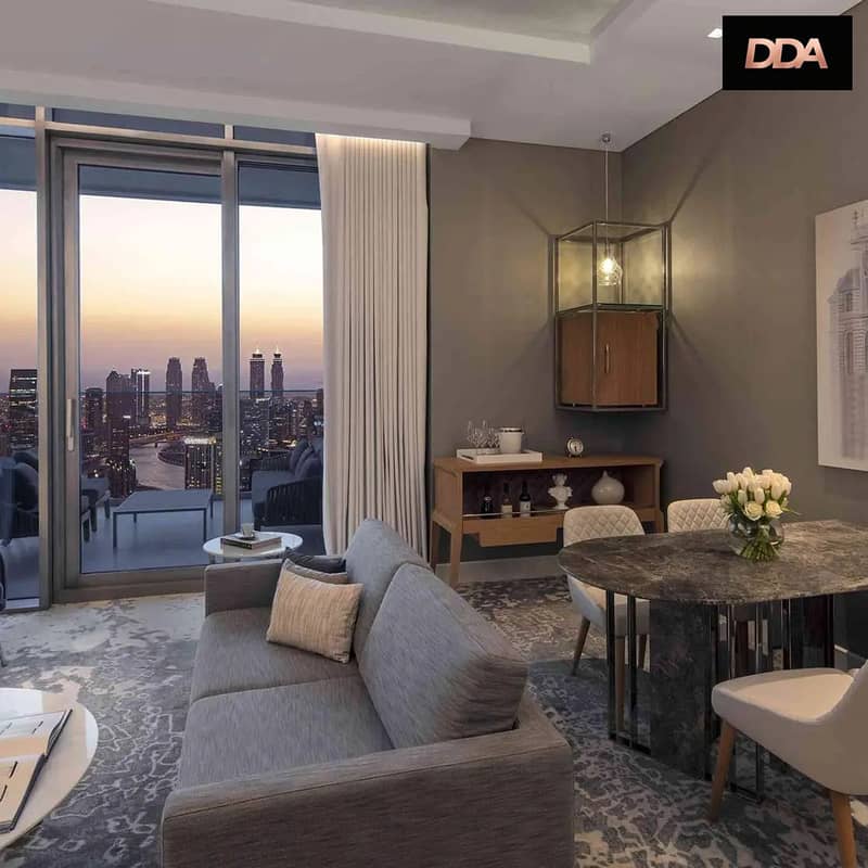 8 sls-dubai-skyfamilykingsuitewithbalcony-livingroomview-1. jpg