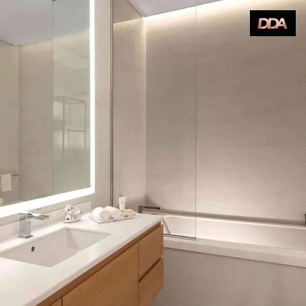 17 sls-dubai-wonder-living-two-bedroom-king-balcony-bathroom-2. jpg