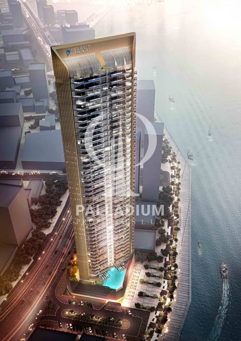 11 6503e67f3ca1f939ee9f796e_DXB MARITIME-SG_TOWER-Aerial_Dusk2-Opt3b (1). jpg