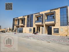 Villa for sale in Ajman, Al Helio area, including registration fees. It consists of 5 master bedrooms, a majlis, a living room, and a maid's room. Fre