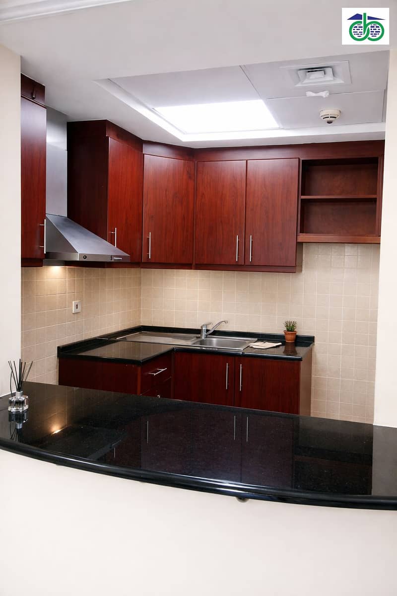 3 Modern kitchen with cherry wood accents. png
