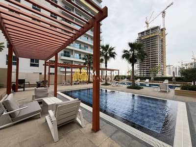 2 Bedroom Apartment for Rent in Jumeirah Village Circle (JVC), Dubai - Stunning Pool View - Resort_Style Living -