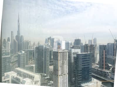 Office for Rent in Business Bay, Dubai - CANAL AND BURJ VIEW|HIGH FLOOR|NEAR TO METRO Office for Rent in Business Bay, Dubai - CANAL AND BURJ VIEW|HIGH FLOOR|NEAR TO METRO